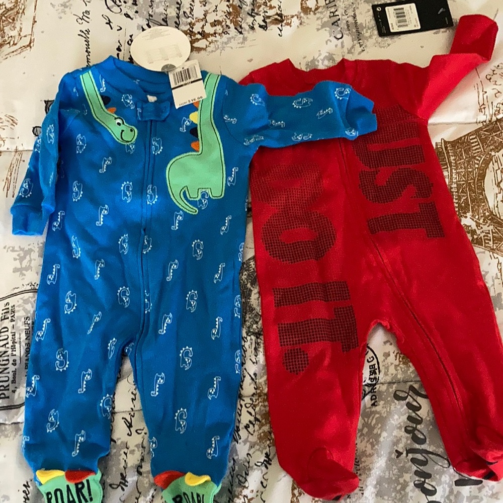 2 footie coverall baby outfits the blue is 0/3 months and the Nike is 3m